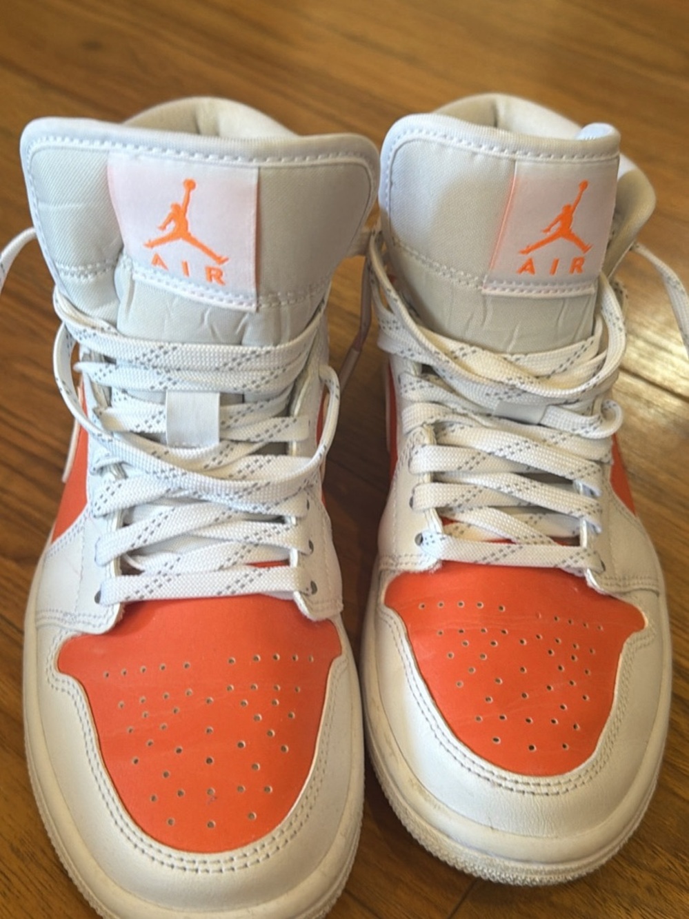 Nike Air Jordan 1 womens High-Top Sneakers in White and Orange size 6